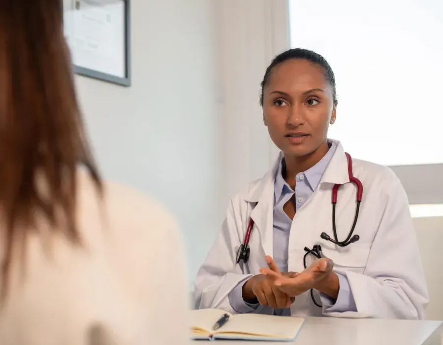 Nurse Practitioner Discussing Treatment Options with Patient